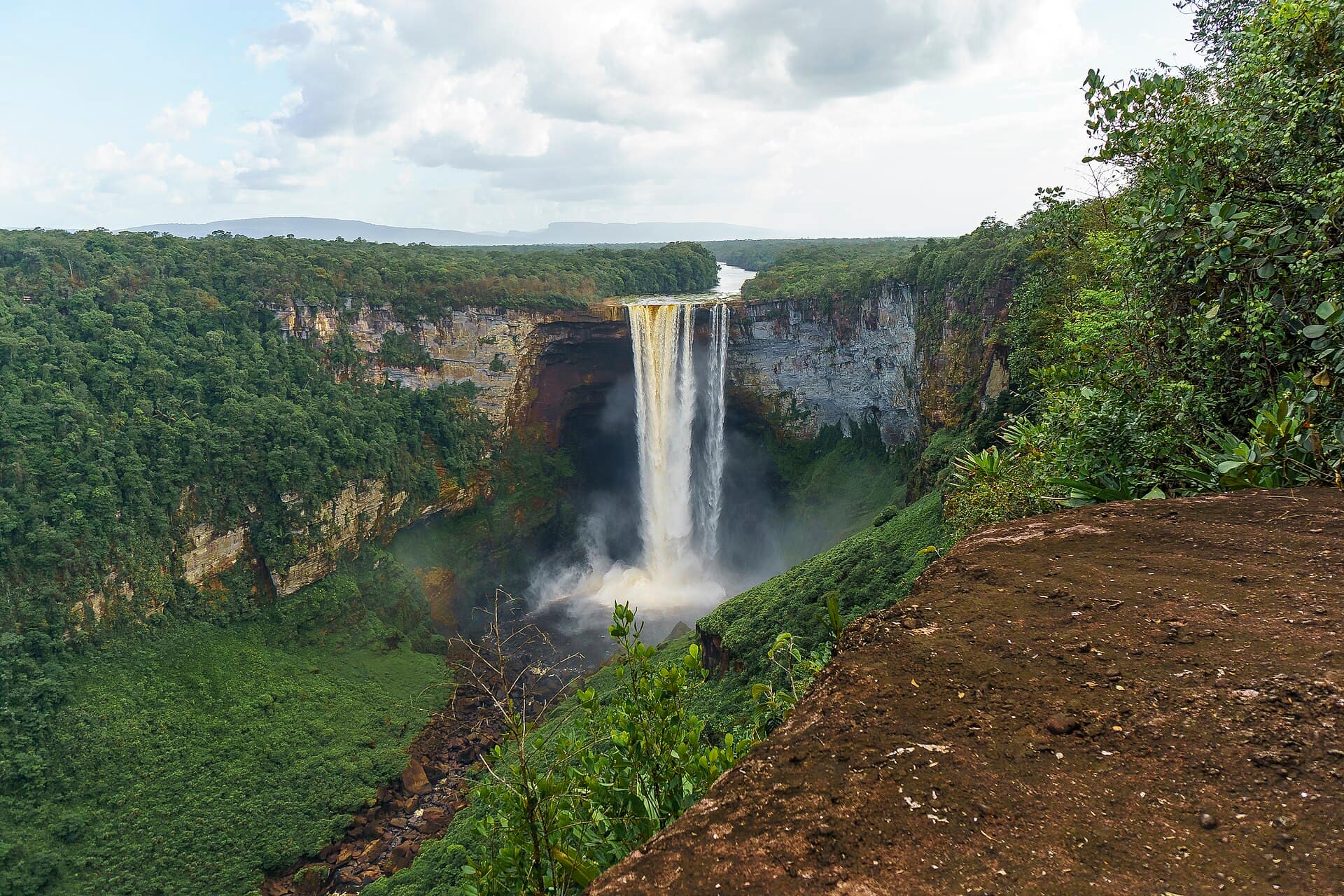 Kaieteur Falls dropping from the edge of the plateau into its forested gorge