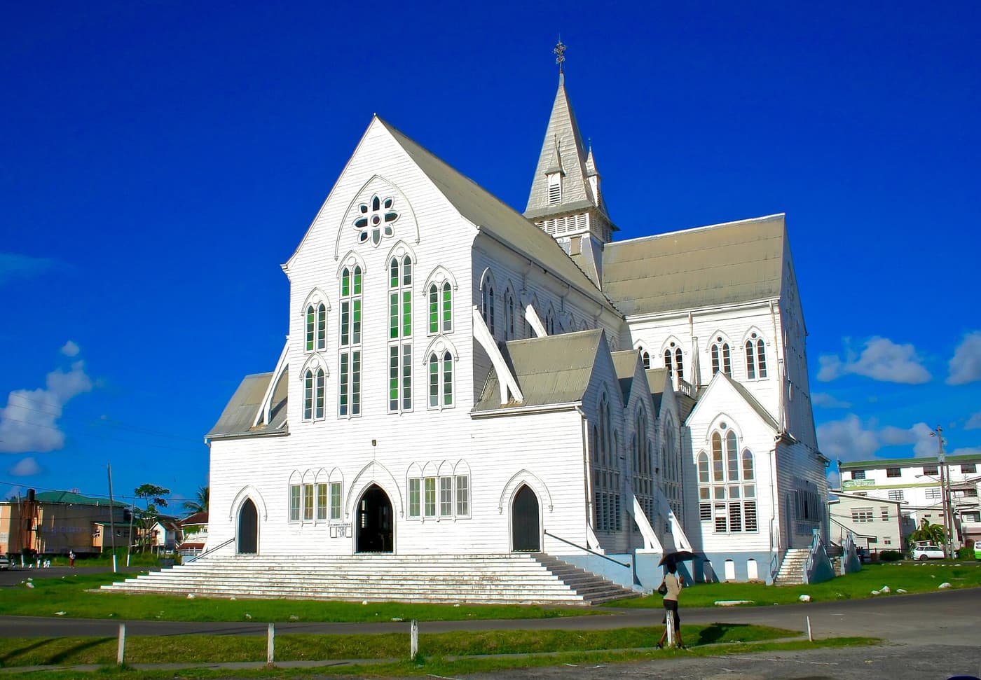 The white timber St George’s Cathedral in Georgetown under a deep blue sky